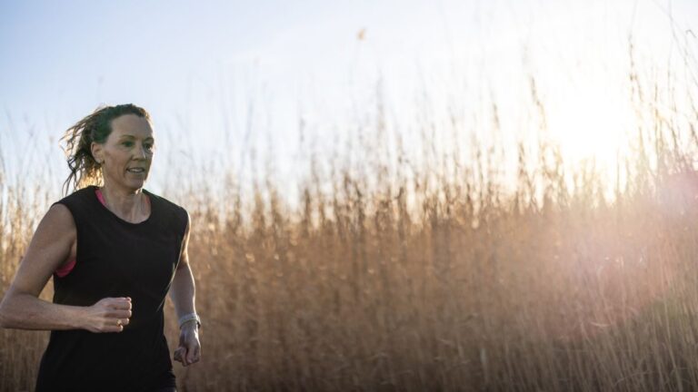 Woman running in the countryside