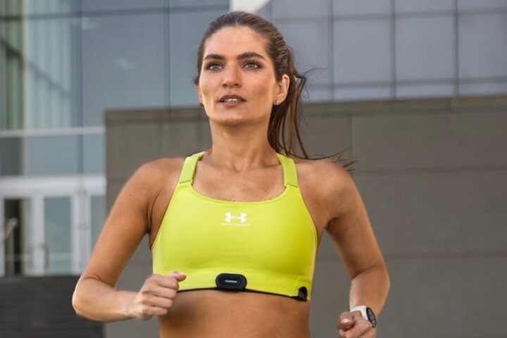 Garmin HRM-Fit chest strap heart rate monitor worn by female runner